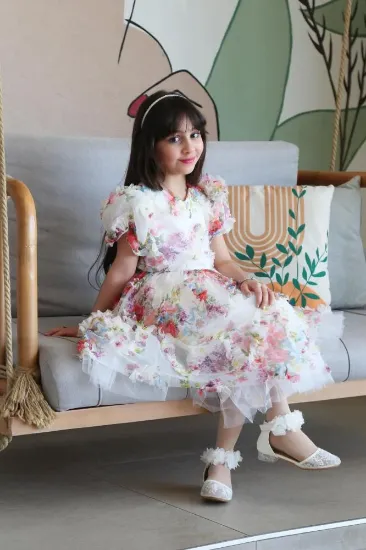 صورة فستان مورد كرنشة من االاسفل